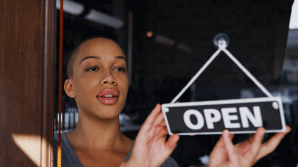 Woman opening store